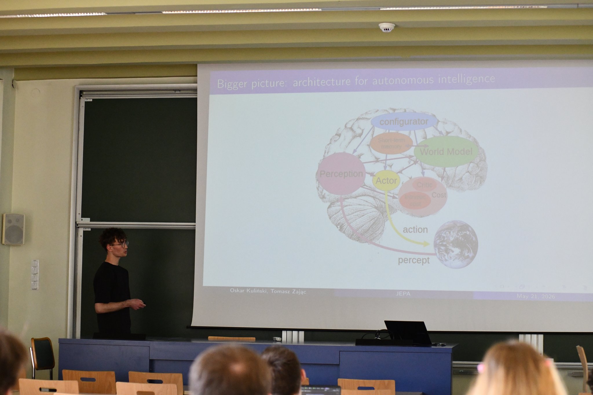 Oskar Kuliński presenting the JEPA architecture